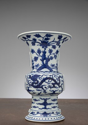 Lot 282 - A BLUE AND WHITE ‘DRAGON’ GU VASE, CHINA, MING DYNASTY