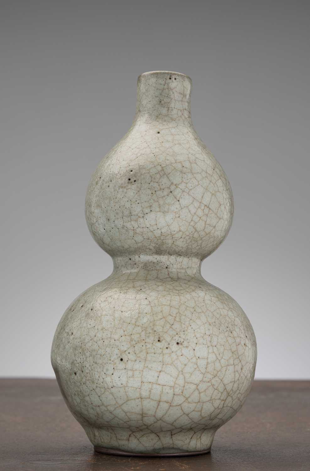 Lot 38 - A CRAQUELURE-GLAZED DOUBLE-GOURD VASE, CHINA, SONG DYNASTY, 12TH–13TH CENTURY