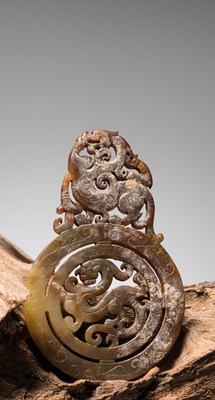 Lot 50 - A HAN DYNASTY OPENWORK JADE BI DISC, CHINA