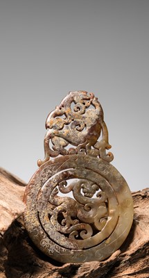 Lot 50 - A HAN DYNASTY OPENWORK JADE BI DISC, CHINA