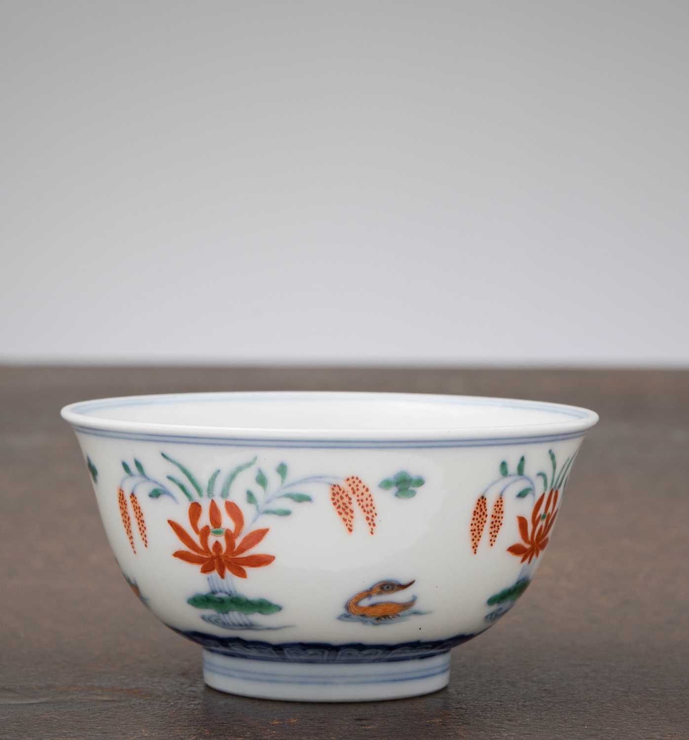 Lot 89 - A FINE DOUCAI PORCELAIN BOWL WITH LOTUS AND WATERFOWL, CHINA, YONGZHENG PERIOD