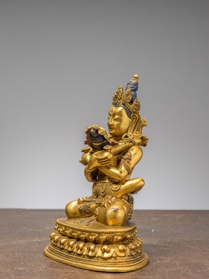 Lot 20 - A SEATED BRONZE GILT STATUE OF SITASAMVARA & CONSORT VAJRAVARAHI IN YAB YUM CHINA 18TH CENTURY