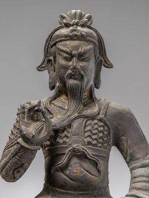 Lot 31 - A CHINESE SEATED BRONZE FIGURE OF GUAN YU, MING DYNASTY