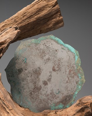 Lot 21 - A CHINESE BRONZE MIRROR WITH MYTHOLOGICAL ANIMALS, HAN DYNASTY
