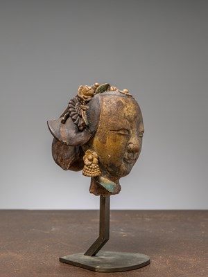 Lot 33 - A GLAZED FEMALE DEITY HEAD, SOUTH-CHINA 18TH CENTURY