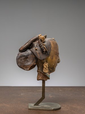 Lot 33 - A GLAZED FEMALE DEITY HEAD, SOUTH-CHINA 18TH CENTURY
