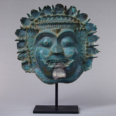 Lot 137 - BRONZE MASK INDIA 16TH CENTURY WITH SILVER TONG