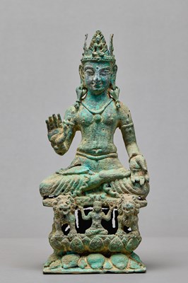 Lot 91 - SEATED BRONZE BODHISATTVA ON A LION THRONE, KASHMIR, 12TH CENTURY