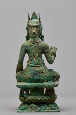 Lot 91 - SEATED BRONZE BODHISATTVA ON A LION THRONE, KASHMIR, 12TH CENTURY