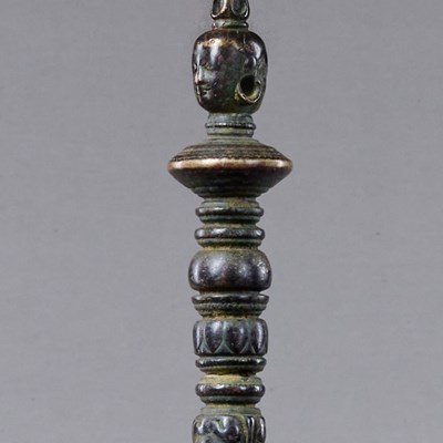 Lot 95 - LARGE RITUAL STAFF FRAGMENT BRONZE TIBET 12TH CENTURY