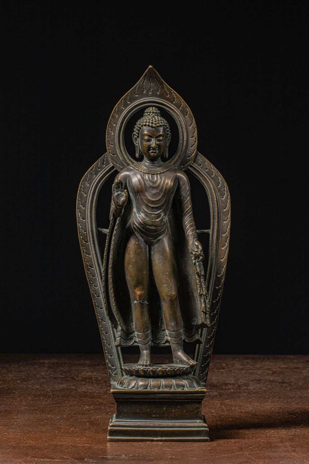 Lot 41 - STANDING BRONZE BUDDHA TIBET 12TH CENTURY STYLE BUT LATER