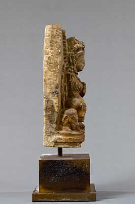 Lot 57 - SEATED GREEN TARA STONE NEPAL 18TH CENTURY
