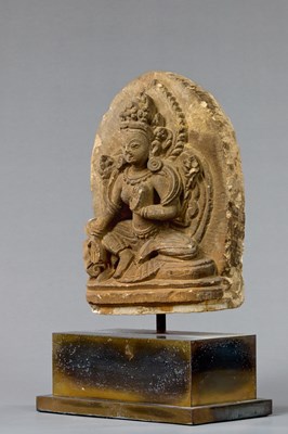 Lot 57 - SEATED GREEN TARA STONE NEPAL 18TH CENTURY