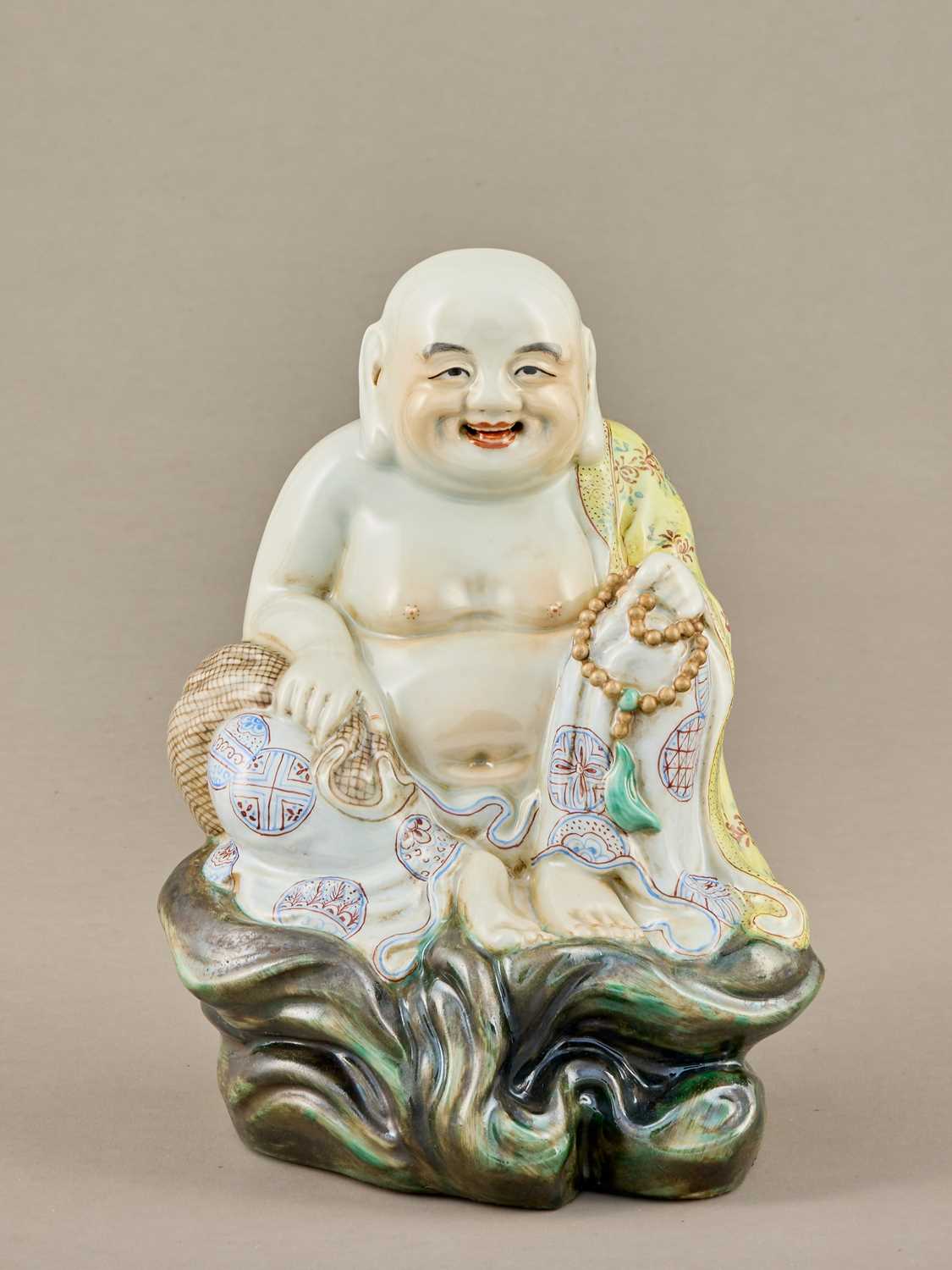 Lot 63 - PORCELAIN FIGURE OF MAITREYA BUDDHA, MINGUO PERIOD