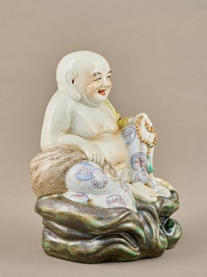 Lot 63 - PORCELAIN FIGURE OF MAITREYA BUDDHA, MINGUO PERIOD