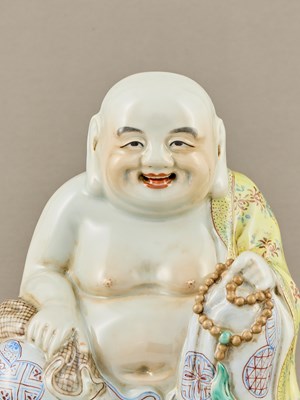 Lot 63 - PORCELAIN FIGURE OF MAITREYA BUDDHA, MINGUO PERIOD
