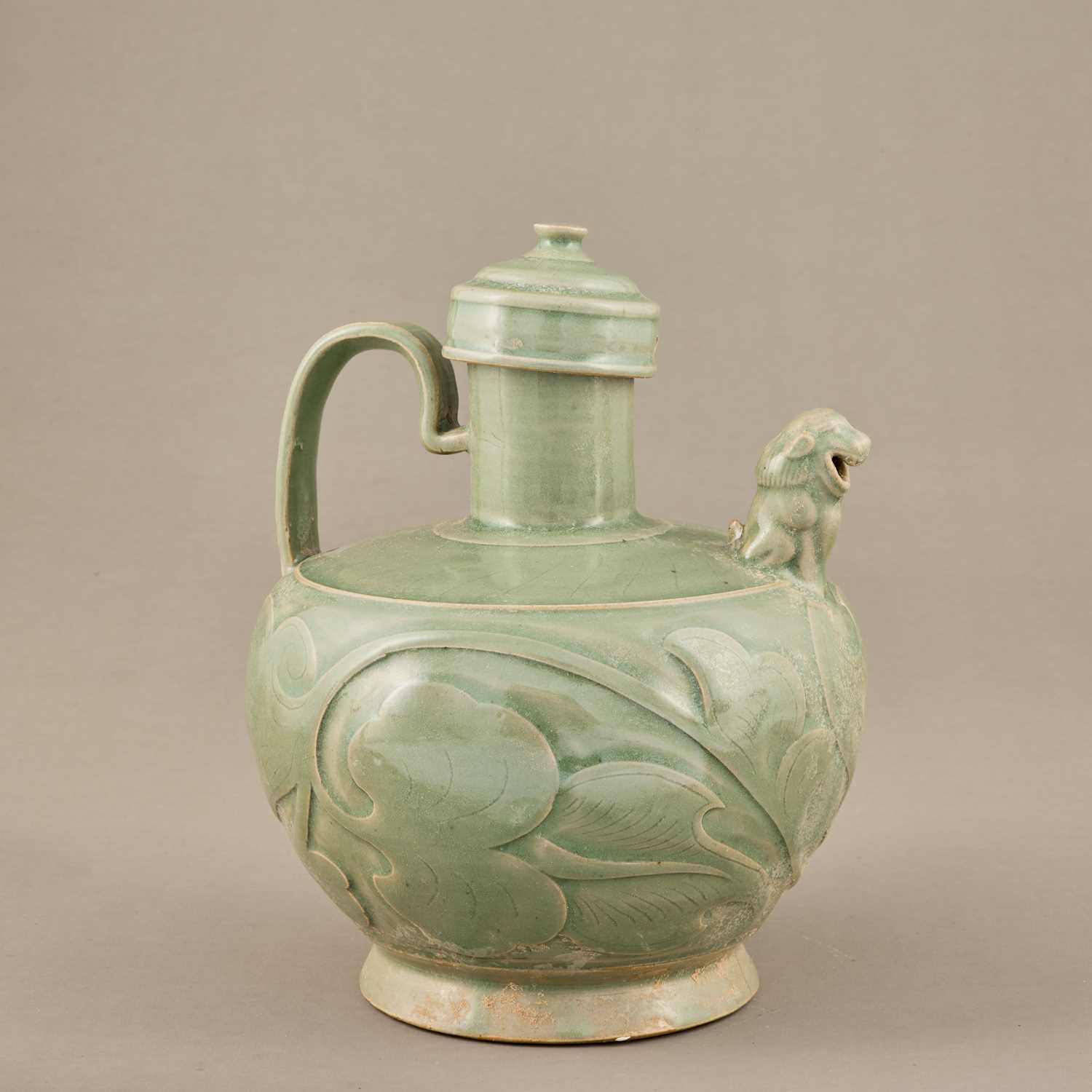 Lot 49 - YAOZHOU CELADON EWER WITH LION-FORM SPOUT, SONG DYNASTY