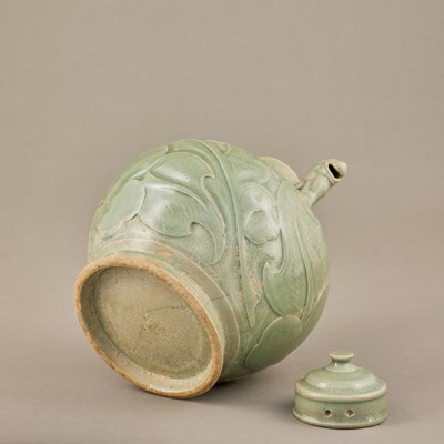 Lot 49 - YAOZHOU CELADON EWER WITH LION-FORM SPOUT, SONG DYNASTY