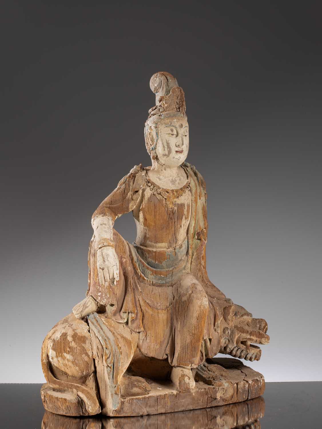 Lot 25 - LARGE GUANYIN ON LION