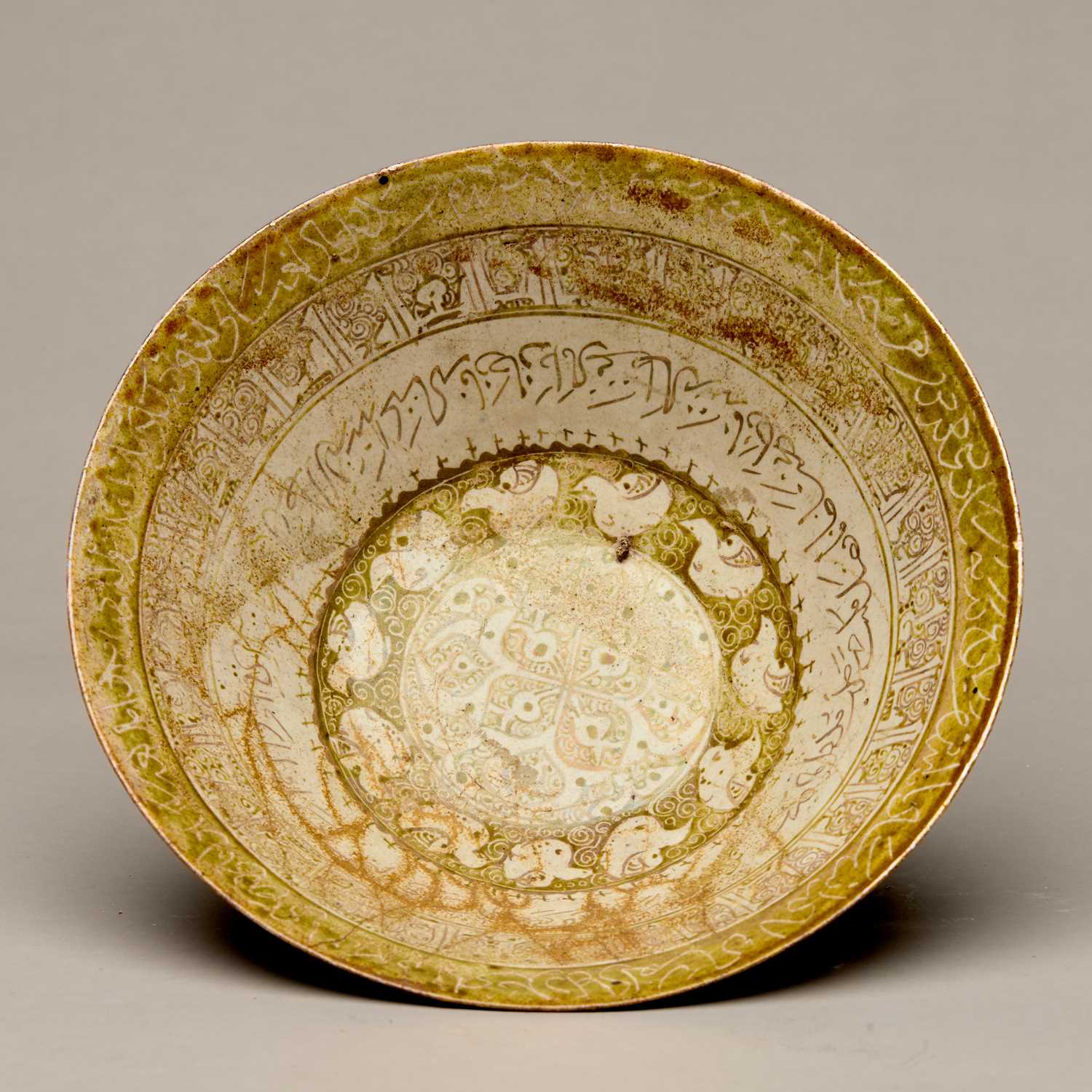 Lot 47 - GLAZED CERAMIC BOWL WITH ISLAMIC INSCRIPTIONS 14TH TO 15TH CENTURY MIDDLE EASTERN