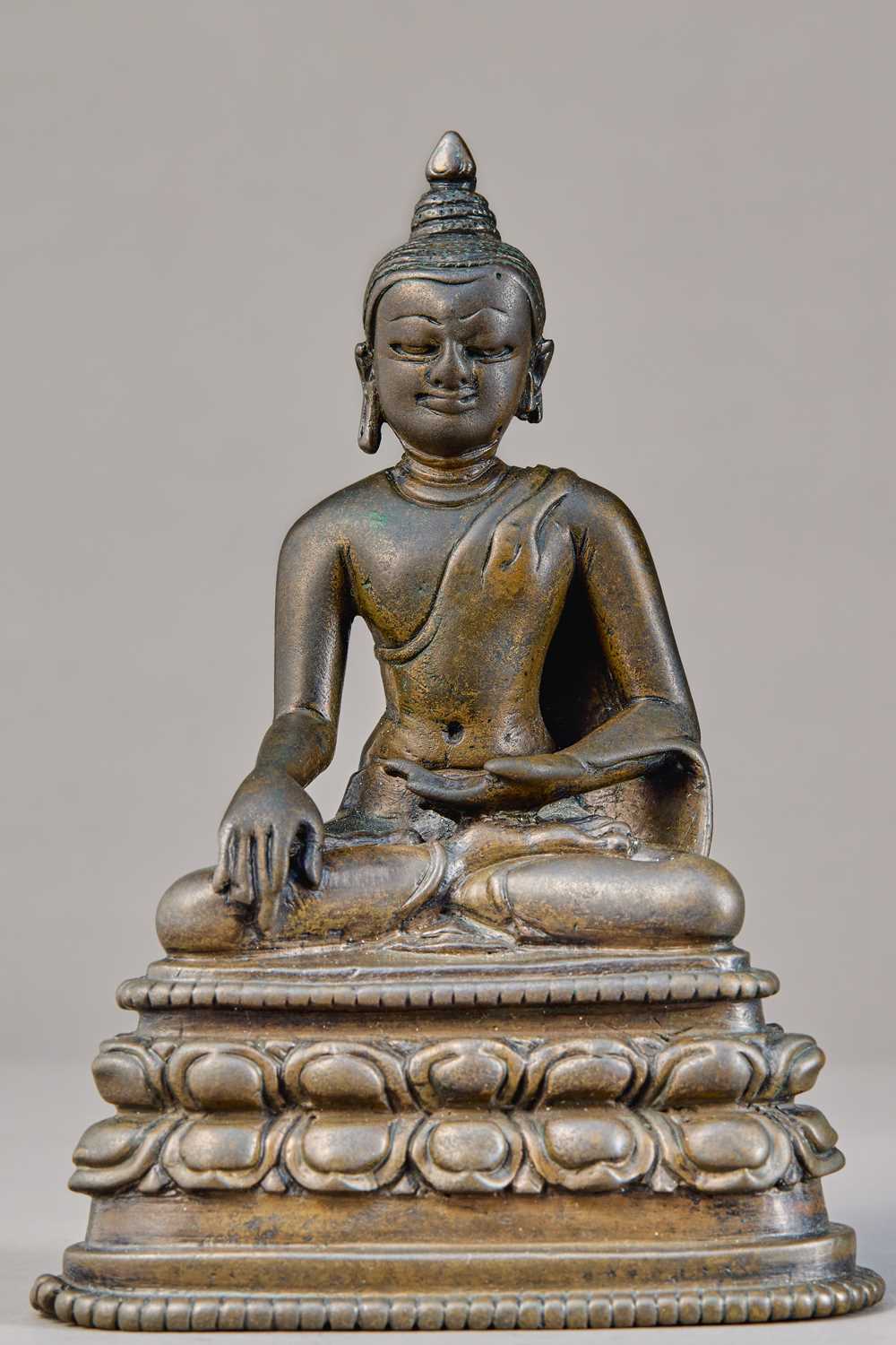 Lot 79 - SEATED BRONZE BUDDHA, NORTH INDIA, BIHAR, PALA PERIOD, 8TH–9TH CENTURY