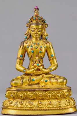 Lot 398 - EXCEPTIONALLY FINE GILT BRONZE FIGURE OF AMITAYUS WITH TURQUOISE , TIBET, 15TH CENTURY
