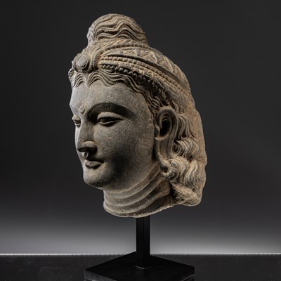 Lot 24 - HEAD OF A BUDDHA