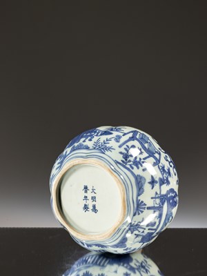 Lot 19 - BLUE AND WHITE FIGURAL JAR
